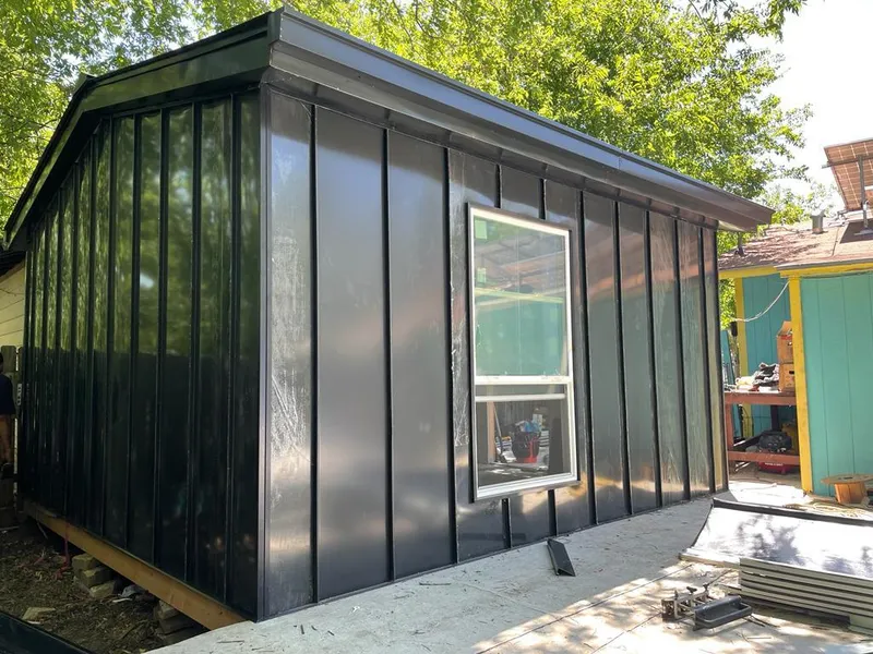 Black standing seam metal wall panels for Roof Inspection in Salida