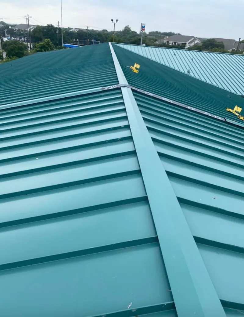 Green commercial metal roof ridge and valley for Metal Roof Repair in Salida